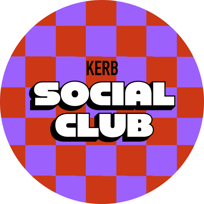 A circular logo with a red and purple chequerboard background. Bold white text in the centre reads SOCIAL CLUB with black shadow, and smaller black text above says KERB.