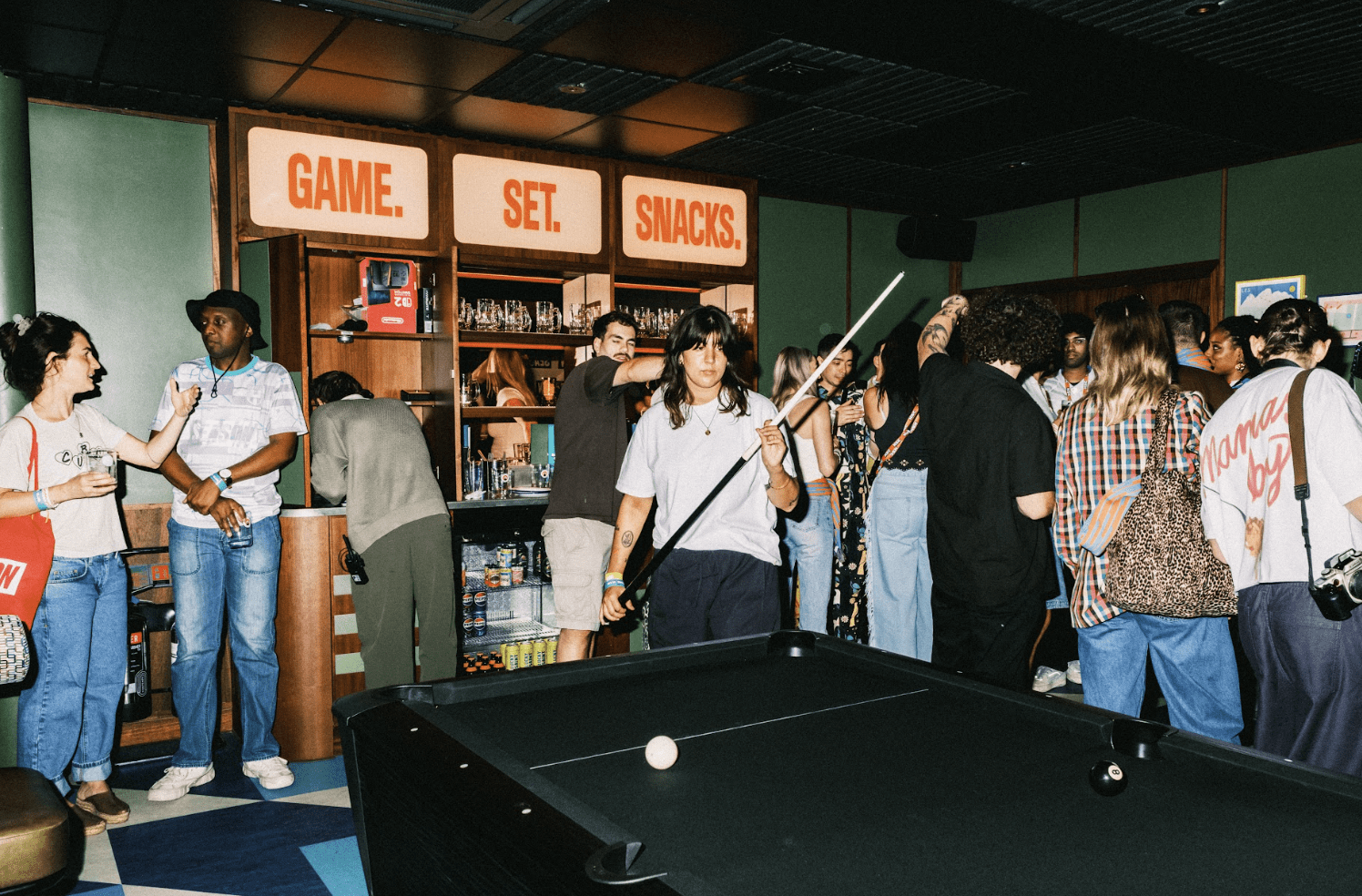KERB Social club person playing pool