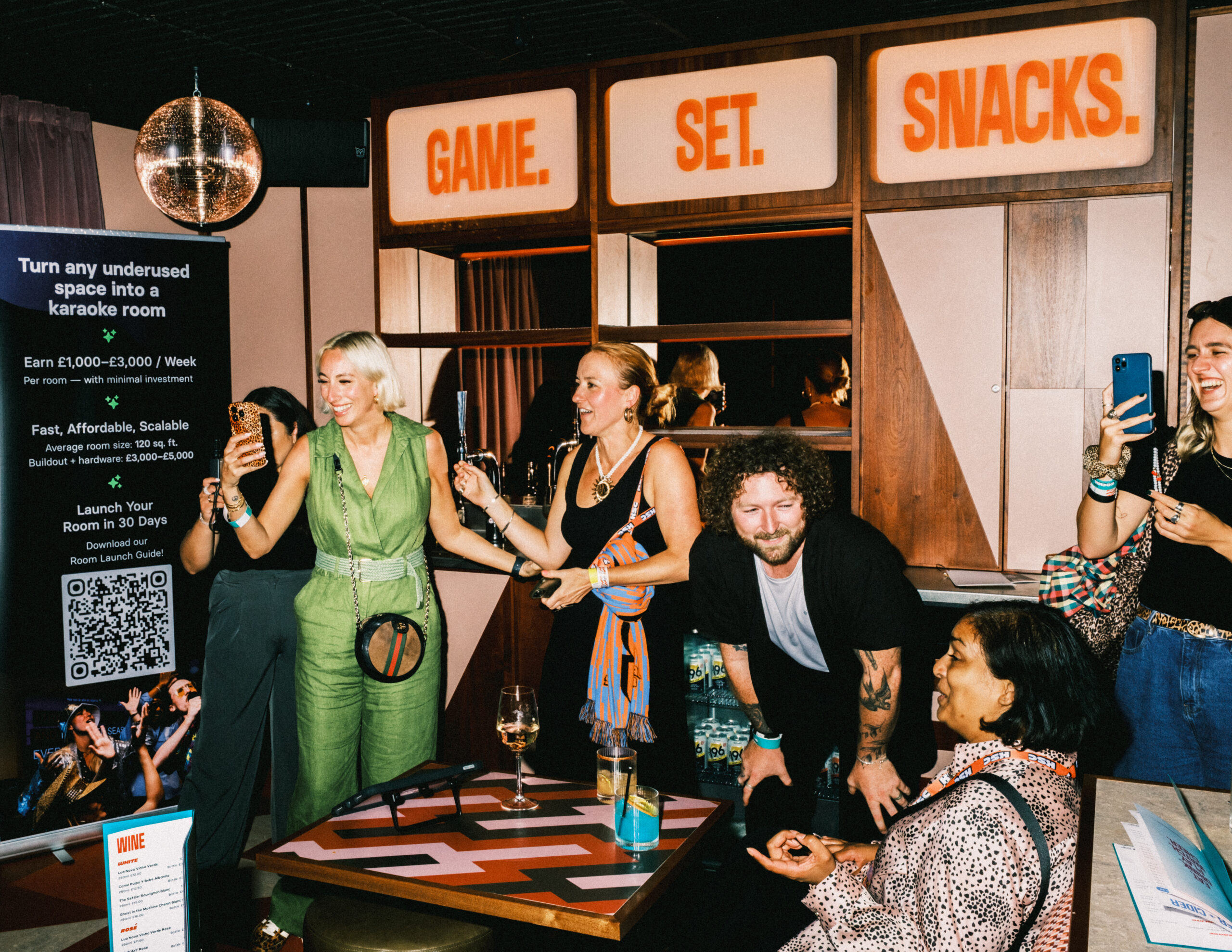 People singing karaoke at KERB Social Club